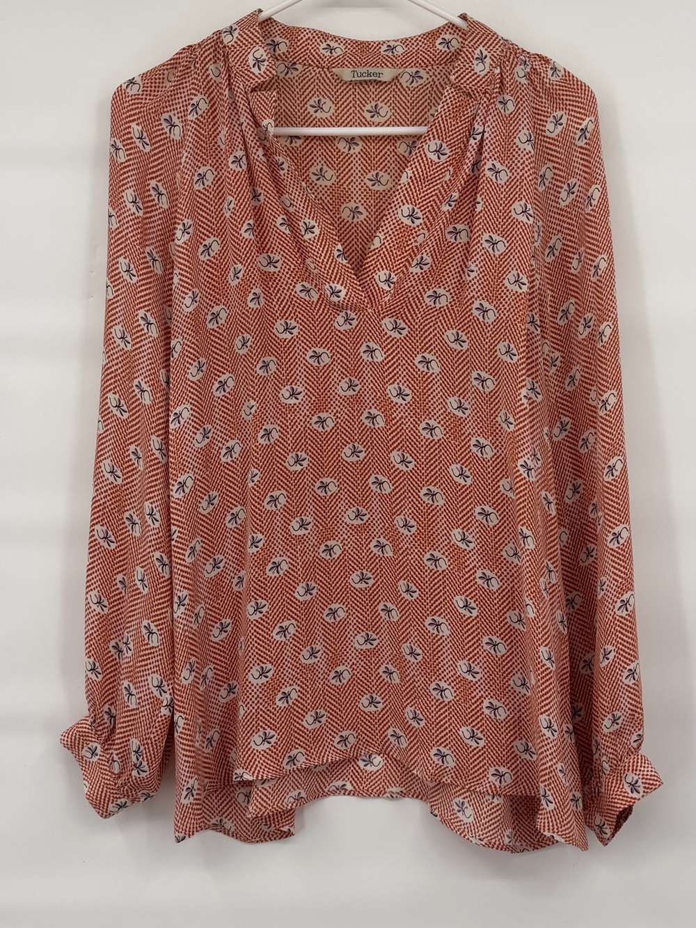 Tucker silk orange floral pattern long sleeve blouse